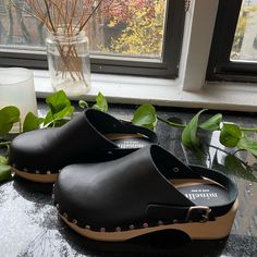 Size 36, Made In Italy, Brand New Never Worn. Details For The Exact Shoe On The Website Here: Https://Www.Minelliparis.Com/Us/En/Clog-Trelida-86085199.Html Shipping From Nyc Black Slip-on Clogs With Buckle Closure, Black Closed Toe Clogs With Removable Insole, Black Clogs With Wooden Heel And Round Toe, Leather Clogs, Leather Mules, Mule Clogs, Mules Shoes, Clogs, Black Color