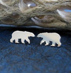 The tiniest little polar bears to adorn your ears. The Details ∞ Artisan handmade ∞ Small polar bear studs (approx 12.5mm x 6mm) ∞ Choose from sterling silver, 14k gold-filled or solid 14k yellow gold ∞ Earring backs included in the metal of your choice ∞ Made to order ∞ Gift box included ∞ Made in the USA IMPORTANT NOTE FOR 14K GOLD FILLED EARRINGS If you are purchasing our gold filled stud earrings please keep in mind they are cut from a sheet of 14k gold filled metal. What this will mean is t Polar Bear Earrings, Sleek Jewelry, Silver Bear, Artisan Jewelry Handmade, Stud Jewelry, Polar Bears, Gold Filled Earrings, Antique Earrings, Yellow Gold Earring