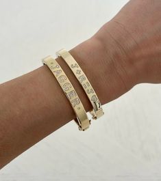 This gorgeous bracelet features the name of your choice in a block font set in diamonds. Price is based on the number of letters in the name. Example shown: JAG is $670 (3 letters) If you do not select the correct amount of letters your order will automatically be cancelled. UPPERCASE LETTERS ONLY Available in 14K Yellow, White or Rose Gold Chain Length: 6" + 0.5" extender All UPPERCASE letters only Up to 8 letters only Letter height approx. 0.25" (varies per letter) FINAL SALE Luxury Diamond Name Bracelet For Anniversary, Personalized Diamond Luxury Bracelets, Luxury Personalized Diamond Bracelets, Personalized Luxury Diamond Bracelets, Luxury Name Bracelet For Anniversary, Elegant Customizable Bracelets For Promise, Elegant Customizable Promise Bracelet, Luxury Personalized Nameplate Bracelet, Luxury Custom Name Bracelet