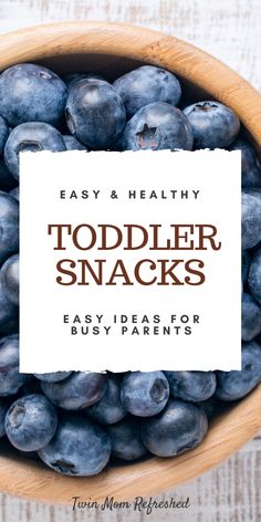 blueberries in a wooden bowl with the title easy and healthy toddler snacks for busy parents