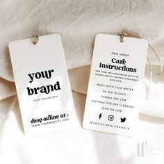 two tags with the words your brand on them are hanging from twine cordes