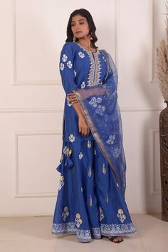 Sky blue hand block foil print straight kurta. Paired with a gharara and organza dupatta with lace detailing.
Components: 3
Pattern: Embroidered
Type Of Work: Digital print
Neckline: Notched
Sleeve Type: Three-quarter
Fabric: Kurta and Gharara: Chanderi, Dupatta: Organza
Color: Blue
Other Details: 
Length:
Kurta: 34 inches
Gharara: 40 inches
Dupatta: 2.5 mtrs
Occasion: Mehendi and Haldi - Aza Fashions Chanderi Dupatta, Blue Kurta, Types Of Work, Straight Kurta, Organza Dupatta, Blue Hand, Foil Print, Set For Women, Aza Fashion