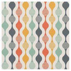 an orange, blue and green pattern with circles on white fabric in various colors that appear to be overlapping