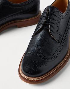 Texture calfskin full brogue Derbys Fine Texture calfskin enriches the contemporary and elegant style of these Longwing Brogue derby shoes. The leather features a slightly high-relief grain with a regular design and is combined with the classic “broguing” decoration that runs along the entire upper. A leather bottom complements the tapered lines of the shoes. Eyewear Womens, Boutique Online, Derby Shoes, Sneaker Heels, Small Leather Goods, Brunello Cucinelli, Shoes Heels Boots, Online Boutique, Sneaker Boots