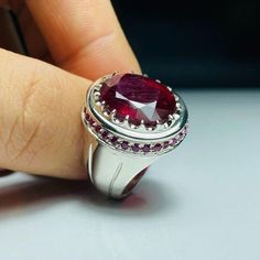 African Ruby Yaqoot Stone Sterling Silver Ring Natural African Ruby Stone Ring Untreated Unheated Original African Ruby Top Quality A+ Stone Ring* Total Carat: 3 Carat * Total Weight Silver: 20 grams * Origin: Africa * Ring Sizes: All US, UK International Size Available (5US,6US,7US,8US,9US,10US,11US,12US,13US,14US,15US,16US) * Re-sizable: Yes * Type: Natural Unheated Untreated Gemstone * Shipment Via FedEx Note: Stone Color as seen on the Store We take the photos mostly in a Natural Daylight Ni Yaqoot Stone, Ruby Stone Ring, Ruby Top, Red Ruby Ring, Rubin Ring, Christmas Ring, Artisan Rings, Ruby Stone, Oval Stone