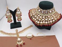 gorgeous bridal set includes mathspati jhumkas nose ring and heavy necklace in  red Bridal Indian, Heavy Necklace, Indian Bridal Jewellery, Red Indian, Indian Jewelry Sets, Kundan Necklace, Necklace Bridal, Jewellery Sets, Red Necklace