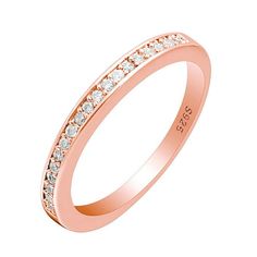 a rose gold wedding ring with rows of diamonds