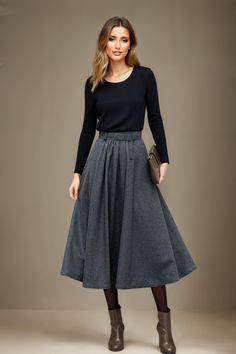 Mid length wool skirt features a waist-cinching design to perfectly show off your figure.Can well show your elegant temperament and taste.Our wool skirt made of high-quality fabric, giving you a good touch and very comfortable to wear.The belt design adds a highlight to it. Detail: 30%wool,30%fiber,40%polyester High waist Skirt with pockets Fabric belt Mid-calf length skirt Back zipper closure Perfect for autumn and winter Dry clean only ★★NOTE ABOUT SIZE: If you cannot find your size in the chart above , we accept custom-made orders. The basic measurements we need for making your order are: [bust]: the fullest part of your bust, not bra size; [natural waist]: the thinnest part of your upper body; [hips]: the fullest part of your hips; Your overall height. ★★ Taking Care: Dry clean Custom Skirt, Autumn Skirt, Skirt Mid Length, Dark Grey Skirt, Skirt Winter, Mid Length Skirt, Skirt Pleated, Belt Design, Winter Skirt