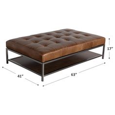 a brown leather ottoman sitting on top of a metal frame base with measurements for the foot rest