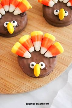 these turkey cookies are decorated with chocolate and candy for the kids to eat on thanksgiving