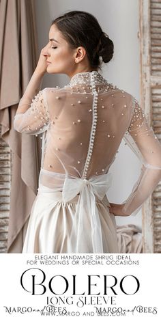 the back of a woman's dress with pearls on it and an advertisement for bolero