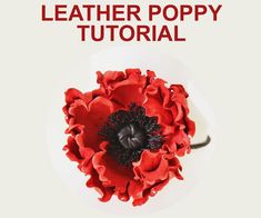 a red flower sitting on top of a white plate with the words leather poppy written below it