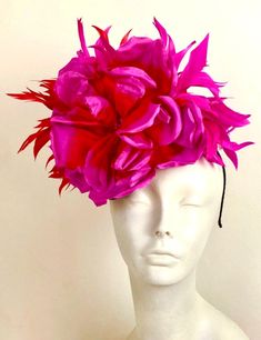 "Red and Fuchsia Fascinator-Wedding- Hot pink Headpiece- Cocktail Hat- Polo match  Hello,          One of a kind- ships in 1 business day. This red and magenta feather fascinator is about 11\" round.  Silk flower is about 8\" wide. It is attached to a black satin adjustable headband that is wrapped in satin and is very comfortable.  On a black straw base.   -------------------------------------------------- I ship US Postal Service.           USA DOMESTIC CHOICES (From mailed date in business days) First Class:  Arrives 3-6 days. (No insurance) Priority:        Arrives 1-4 days.  (Insurance included)                   Express:       Arrives 1-2 days.  (Insurance included)      INTERNATIONAL CHOICES (From mailed date in business days) First Class:  Arrives 10-26 days. Priority:        Arriv Pink Hair Accessories For Spring Formal Events, Pink Flower Headpiece For Kentucky Derby, Pink Hair Accessories With Handmade Flowers For Summer, Formal Pink Headband For Summer, Formal Pink Hair Accessories, Pink Flower Fascinator For Kentucky Derby, Pink Summer Fascinator For Ceremony, Pink Fascinator For Kentucky Derby Ceremony, Pink Flower Headband For Wedding