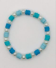 Blue Preppy Bracelet Ideas, Beachy Clay Bracelets, Light Blue Clay Bead Bracelet, Blue And White Clay Bead Bracelets, Clay Bead Bracelet Ideas Ocean, Clay Bead Design Ideas, Heshi Bead Ideas, Blue Bracelet Ideas, Aesthetic Bracelet Ideas