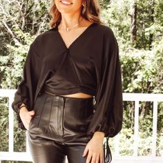 Gorgeous Black Silky Wrap Style Blouse Brand New Boutique Blouse Some Boutique Pieces Do Not Have Tags Long Balloon Sleeves With Coordinating String Tie V Neckline Cropped Length Back Hem Is Elasticized This Stunning Silky Blouse Would Be A Perfect Choice For A Cocktail Party Or Date Night Versatile V-neck Blouse For Night Out, Fall Evening Tops With Blouson Sleeves, Elegant V-neck Crop Top For Workwear, Chic Crop Top With Blouson Sleeves For Fall, Chic Fall Crop Top With Blouson Sleeves, Chic Blouson Sleeve Crop Top For Fall, Elegant V-neck Crop Top For Work, V-neck Blouse For Going Out In Fall, Chic Padded Blouse Crop Top For Fall