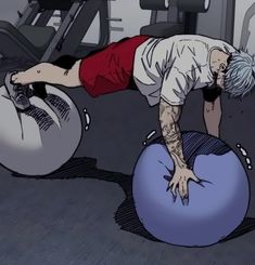 a man doing push ups on an exercise ball