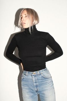 Perfect basic turtleneck in a thick ribbed knit. Fabric is 100% organic cotton. Ella is 6' tall, 36" bust, 26" waist, 36" hip, and is wearing a size S. Basic Turtleneck, Ribbed Knit Fabric, Basic Colors, Custom Items, Fashion Brand, Ribbed Knit, Knit Fabric, Black Color, Organic Cotton