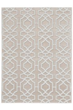 a beige and white rug with an intricate design