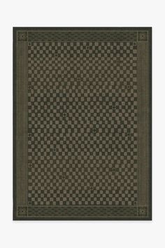 a black and brown rug with squares on it