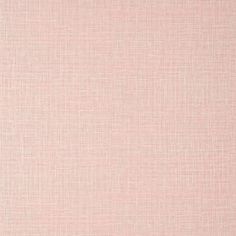 a light pink fabric textured with small squares