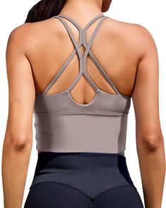 PRICES MAY VARY. Sports bras down to a science. This crop tops sports bra Just take it from this medium-support style. workout crop top designed with a breathable strappy design in back, adjustable stretch straps workout bras for women,athletic crop tops for women moisture-wicking fabric and an all-way stretch construction.this versatile sports bra crop top is built for every day with its light-support construction, soft compressive jersey and removable cups.medium impact sports-compression-tops Gray Top With Built-in Bra And Medium Support, Sports Crop Top With Light Support And Tank Straps, Functional Tank Sports Bra For Light Sports, Seamless Tank Strap Sports Bra For Gym, Seamless Sports Bra With Tank Straps For Gym, Seamless Sports Bra With Tank Straps, Supportive Sleeveless Crop Top For Gym, High Stretch Sleeveless Gray Sports Bra, Gray Sleeveless Sports Bra For Workout