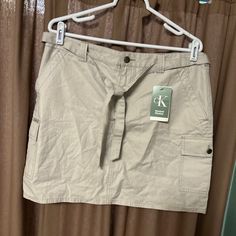 Nwt Khaki Skirt With Pockets And Sash Belt Casual Fitted Calvin Klein Skirt, Fitted Calvin Klein Casual Skirt, Calvin Klein Fitted Casual Skirt, Calvin Klein Skirt For Spring, Casual Calvin Klein Bottoms With Pockets, Calvin Klein Casual Bottoms With Pockets, Khaki Mini Skirt, Khaki Skirt, Sash Belts