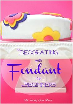 a cake with fondant for beginners sitting on top of each other and the words decorating with fondant for beginners above it