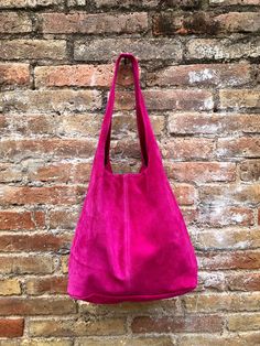 Tote leather bag in HOT FUCHSIA PINK. Slouch bag made with natural genuine SUEDE leather in FUCSIA. Closed by a zipper at the top. Soft suede shoulder bag in MAGENTA. Bag for books, Ipad Tablets etc. Pink leather shopper. NOT LINED. Width : 42cm - 16,5 in Height at the center: 34 cm - 13, 5 inc Total height : 65,5 cm - 26 inch This bag in different colors and other leather Bags by Good Times Barcelona: https://www.etsy.com/shop/goodtimesbarcelona?section_id=18820154&ref=shopsection_leftnav_10 Ob Pink Hobo Bag For Shopping, Suede Lined Hobo Tote Bag For Shopping, Pink Leather Hobo Bag For Everyday, Everyday Pink Leather Hobo Bag, Pink Soft Leather Hobo Bag For Everyday Use, Pink Leather Hobo Bag, Pink Soft Leather Hobo Bag For Daily Use, Elegant Pink Leather Hobo Bag, Pink Soft Leather Hobo Shoulder Bag