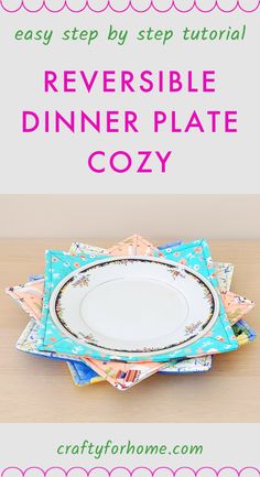 White plate on blue fabric plate cozy.