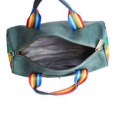 Blue Vegan Leather Barrel Shaped Handbag Featuring Rainbow Sides and Rainbow Canvas Handle Detail. Main Zipper Closure. Front Twist Lock Pocket. Detachable Shoulder Strap Included. Green Faux Leather Satchel For Travel, Green Faux Leather Travel Satchel, Blue Faux Leather Travel Bags, Blue Rectangular Faux Leather Bag, Rainbow Canvas, Fashion Bottoms, Blue Rainbow, Kids Graphic Tees, Hoodies Mens