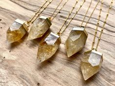 "Real crystal points in your choice of yellow Citrine or pink Rose Quartz dipped in gold electroplating! These stones measure approximately 20-25mm x 30-40mm. Chains are available in your choice of length: 18\" for a standard necklace length, 24\" for medium length, or 30\" for long length. You may also choose your chain finish: Real 14K Gold filled or Gold plated. I highly recommend the real 14K Gold filled chains as they are tarnish resistant & hypoallergenic! Finally, you may choose your Raw Citrine Necklace, November Birthstone Jewelry, Cash Crop, Raw Citrine, Crystal Point Necklace, Raw Rose Quartz, Citrine Jewelry, Citrine Necklace, Yellow Citrine