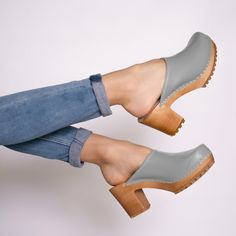 "The clogs are availble in white, yellow, purple, hot pink, beige,red,blue, turquiose, black, deep brown, grey,navy blue. Heel high 3\". Our handmade wooden clogs are made in a traditional European shoemaker workshop. ~made of finest european wood and natural leather ~anatomicall footbed with arch support ~adjustable fasten on the ankle ~wooden sole covered with a thin rubber Our beautiful clogs are: ~perfect for every woman ~stylish and useful for casual wear ~perfect solution for looking both Shoes Leather Women, Summer Women Shoes, Clogs Women, High Heel Clogs, Moccasins Women, Swedish Clogs, Shoes Heel, Wooden Clogs, Clog Heels