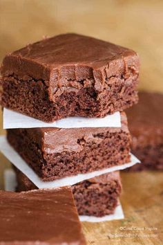 three chocolate brownies stacked on top of each other