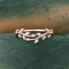 Branch Curved Wedding Band Unique Rose gold Moissanite Wedding Band Vintage Round cut ring Art deco Bridal Leaf Stacking ring Promise ring ----------Ring Details ---------- ☆Stone: Moissanite ☆Stone weight: about 0.07ct ☆Band Width: Approx. 1.3mm ☆Band Thickness: Approx. 1.2mm This ring is made of Solid gold (14k/18k gold, yellow gold, rose gold are available). All ring size can be made, please contact me if you couldn't find your ring size from the list. ----------Custom Service---------- I acc Laurel Wedding Band, Rose Gold Wedding Jewelry With Halo Design, Rose Gold Round Cut Wedding Jewelry, Rose Gold Jewelry With Prong Setting For Marriage, Rose Gold Rings With Prong Setting For Wedding, Rose Gold Diamond Ring For Marriage With Prong Setting, Rose Gold Wedding Ring Jewelry, Rose Gold Brilliant Cut Jewelry For Marriage, Fine Jewelry Rose Gold Diamond Ring For Wedding