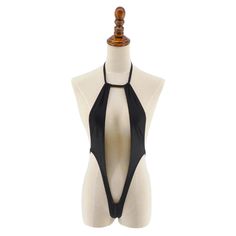 Unleash your daring side with our Daredevil Extreme Micro Thong Monokini Swimsuit. This bold and daring swimwear features a revealing thong design, perfect for your next private pool session. Step up your swim game and make a statement with this seductive swimsuit. This stunning micro monokini is crafted from high-quality Nylon/Spandex, ensuring a soft, stretchy, and comfortable fit. Material: Nylon/Spandex Black Backless Bodysuit With Boning, T-back Swimwear For Beach Party, Party Swimwear With T-back And Lined Body, Party T-back Lined Swimwear, Black T-back Bodysuit For Beach, Black T-back Bodysuit For The Beach, Night Out Boning Backless Bodysuit, Backless Boning Bodysuit For Night Out, Backless Party Swimwear With Boning