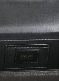 100% Calf Leather Designer Black Clutch With Rectangular Case, Designer Black Clutch In Rectangular Case, Designer Black Rectangular Clutch, Designer Textured Leather Rectangular Clutch, Designer Bag With Interior Card Slots, Designer Evening Bag With Interior Card Slots, High-end Leather Wallet For Formal Occasions, Designer Evening Clutch With Interior Card Slots, Designer Leather Clutch In Rectangular Case