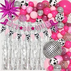 a pink and silver birthday party with balloons