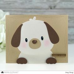 a close up of a card with a dog on it's front and side