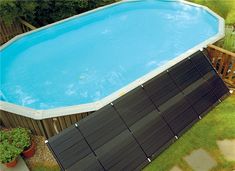 an above ground swimming pool with solar panels