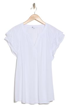 Fluttery lace-trim sleeves frame this lightweight woven top cut in with a V-neckline and a flowy fit. 28" length V-neck Short sleeves 100% rayon Machine wash, dry flat Imported Woven Top, Flutter Sleeve, Nordstrom Rack, Lace Trim, Short Sleeves, Nordstrom, Trim, V Neck, Lace