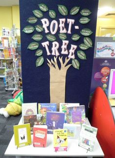 there are many books on the table and in front of this sign that says pott - tree