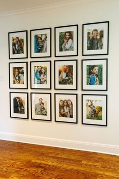 a wall with many pictures on it and a wooden floor in front of it,