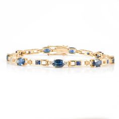 This is a classic elegant dainty bracelet. A must-have statement piece for every woman. A perfect gift for your loved ones. -Material - 14K Solid Yellow Gold -Gemstone - Genuine Sapphire Diamond -Gemstone Weight - 6.900 ct - Diamond Weight -0.320 Ct -Gross weight - 9.00 grams The bracelet length can be adjusted to your wrist size, on request. You can also go to my shop Home for more similar bracelets: https://www.etsy.com/in-en/shop/SilverAppeal We offer free resizing, and any customization is w Classic Oval Chain Bracelet For Anniversary, Oval Link Gemstone Bracelets For Anniversary, Woman Bracelets, Diamond Gold Bracelet, Solitaire Bracelet, Bracelet Tennis, Gold Armband, Dainty Bracelet, Emerald Pendant