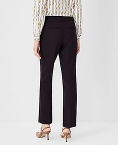 Elevate your wardrobe with the Ann Taylor Mid Rise Sophia Straight Pant in Curvy Fit. These pants redefine sophistication with their timeless straight-leg design, tailored to skim your legs for a chic, structured silhouette. Perfect for both office and evening wear, these pants are a versatile staple for any fashion-conscious woman.

- **Size:** 00 Regular
- **Color:** Black
- **Gender:** Female
- **Material:** 65% Polyester, 32% Rayon, 3% Spandex
- **Fit:** Tailored and fitted with a mid-rise w Chic Straight Leg Career Dress Pants, Chic Straight Leg Dress Pants For Career, Chic Tailored Straight Bottoms, Chic Tailored Straight Dress Pants, Chic Straight Bottoms For Formal Occasions, Chic Straight Pants, Elegant Straight Pants For Work, Chic Straight Pants With Belt Loops, Chic Tailored Straight Pants