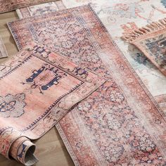 several rugs laid out on the floor