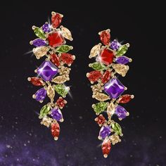 These statement earrings are designed to add a pop of color to your outfit. Finished in yellow gold, the drop earrings feature a cluster of multi-colored sparkling Diamondeau®, flawless simulated diamond to add vibrancy to your everyday look or evening attire. This is the ideal set for those who love to express their unique style and stand out from the crowd. Multicolor Cubic Zirconia Earrings For Party, Multicolor Cubic Zirconia Party Earrings, Party Multicolor Cubic Zirconia Earrings, Multicolor Cubic Zirconia Earrings For Formal Occasions, Multicolor Multi-stone Earrings For Party, Elegant Multicolor Earrings With Sparkling Stones, Party Multicolor Multi-stone Earrings, Elegant Multicolor Earrings For Evening, Evening Attire