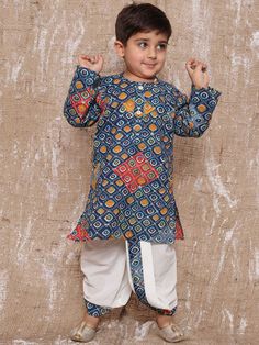 **Specifications : Please visit our brand store** https://www.etsy.com/in-en/shop/AJDezines?ref=seller-platform-mcnav Kurta : Bandhani Print Kurta made in cotton fabric with front button opening. Dhoti : Dhoti made in cotton fabric, detailed design printed on border with elasticated waist 2 Pc Set : 1 Kurta, 1 Dhoti Care: Gentle Handwash. Made in the auspicious color palette and crafted in soft cotton, this dhoti-kurta set is a comfortable and versatile pick for the little desi dude's next tradi Bandhani Print, Boys Kurta, Dhoti Pants, Festive Wear, Brand Store, Kurta Set, Mandarin Collar, Festival Wear, Boy's Clothing