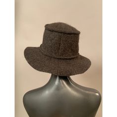 This three season Chanel wool hat is in excellent condition, marked a size 57, and it is so soft it can be folded to pack flat in your suitcase for travel. The color is a mix of brown and grey  and it has a channel quilted brim. The interior circumference of the hat is 21". Brown Wool Cloche Hat With Short Brim, Brown Wool Cloche Hat For Winter, Brown Wool Cloche Hat With Curved Brim, Classic Brown Wool Cloche Hat, Winter Brown Flat Brim Cloche Hat, Brown Flat Brim Cloche Hat For Winter, Wool Travel Hat With Short Brim, Wool Hat With Short Brim For Travel, Brown Wool Felt Hat For Travel