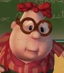 a cartoon character with glasses and a bow on his head in front of a chalkboard