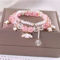 Kawaii Anime Melo Kuro Crystal Bracelet This Kawaii Anime Melo Kuro Crystal Bracelet combines cuteness and elegance with its delicate crystals. Adorn your wrist with this charming accessory and add a touch of uniqueness to any outfit. Perfect for any anime lover, this bracelet will surely be an eye-catching addition to your jewelry collection. Anime Bracelet, Kawaii Bracelet, Girly Bracelets, Ethereal Jewelry, Shells Recipe, Products Photography, Kuromi Cinnamoroll, Parcel Delivery, Kawaii Jewelry